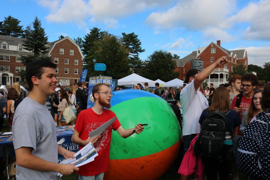 The+Young+Americans+for+Liberty+encourage+students+to+write+on+the+free+speech+ball+at+U-Day+in+September.+Photo+courtesy+of+Ian+Lander.