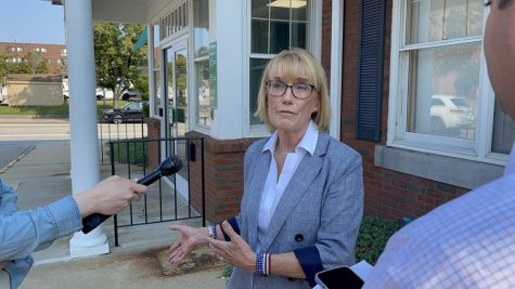 Sen. Maggie Hassan speaks with reporters Sept. 10, 2022, after a canvassing kickoff event with Democrats in Dover, N.H. (Steven Porter/Granite Memo)