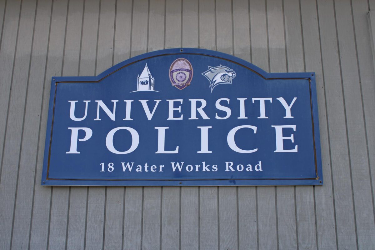 Sign on the outside of the UNH PD building at 18 Waterworks Road, Durham, NH  